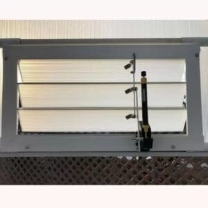 A window with shutters on the outside of it.